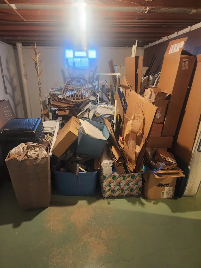 Roll-off dumpster container at job site for Concrete Dumpster Rental in Henniker